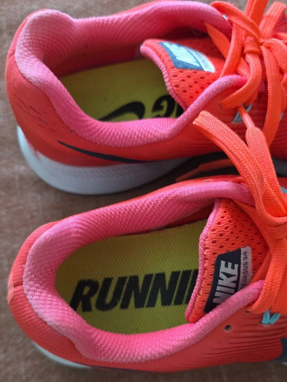 Nike Women's Coral-Pink Running Sneakers with Navy Swoosh